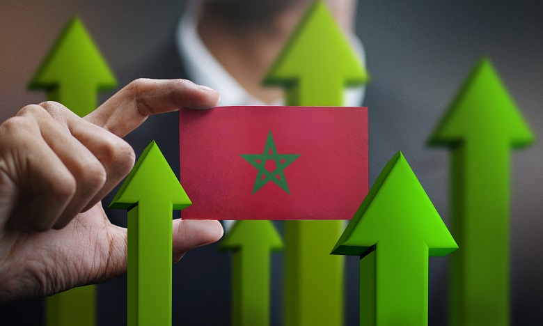 Nation,Growth,Concept,,Green,Up,Arrows,-,Businessman,Holding,Card